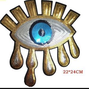 NWOT Drippy Gold Eyeball Applique 12" x 10"